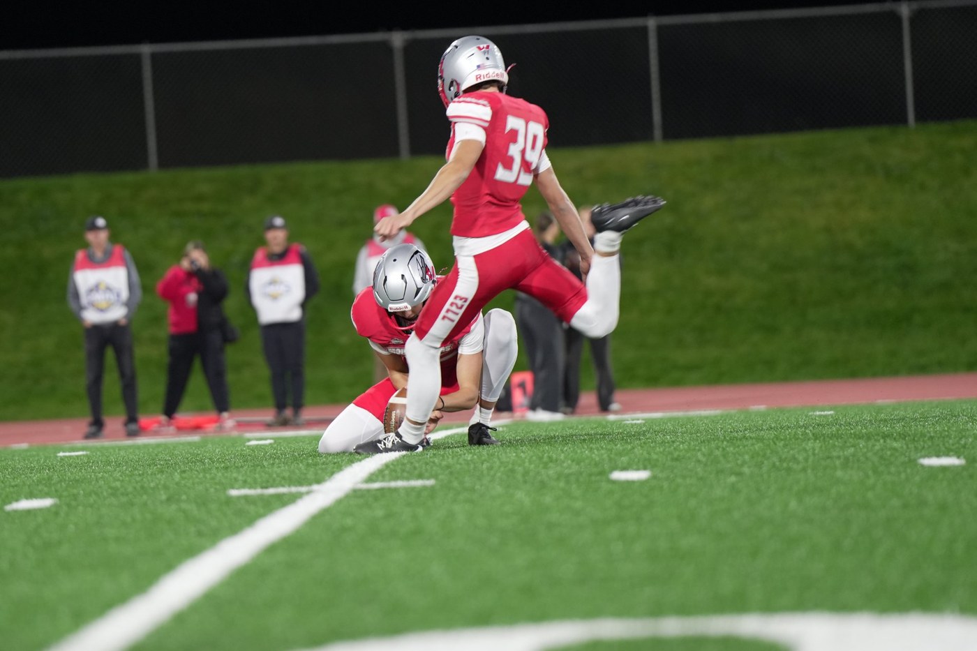 Dylan Burns, kicker, kicking a field goal for Western Colorado